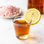 ACV Pink Himalayan Salt detox shot recipe in a clear glass.