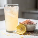 Pink Himalayan salt lemonade for post workout recovery in close up
