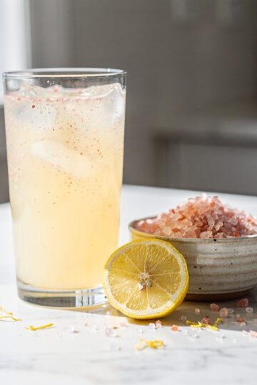 Pink Himalayan salt lemonade for post workout recovery in close up