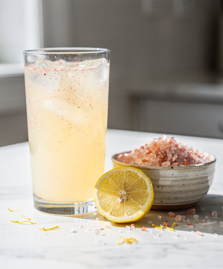Pink Himalayan salt lemonade for post workout recovery in close up