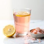 Morning ritual Himalayan pink salt fat burning recipe in a bright glass.