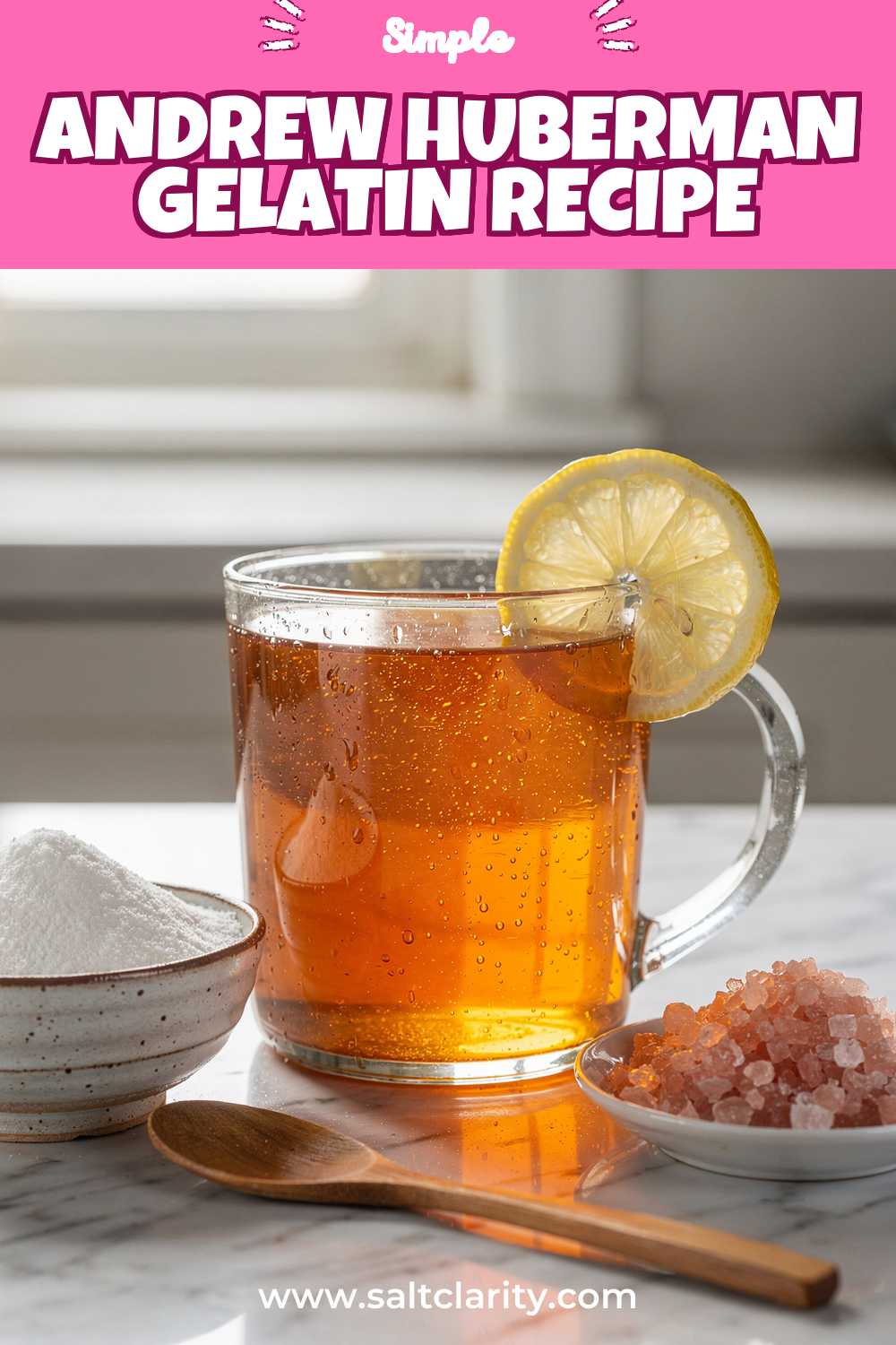 Clear glass mug of shimmering amber gelatin drink with lemon.