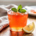 Vibrant homemade gelatin dessert with creamy glossy strawberry layers