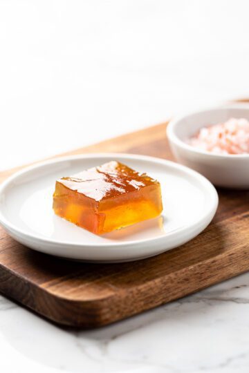 Clear amber gelatin gummy squares with ginger and salt
